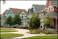 Homes, lawns, sidewalk